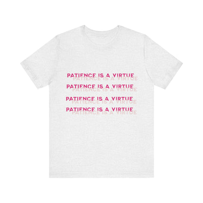 White t-shirt with 'Patience is a Virtue' text in pink on a white background